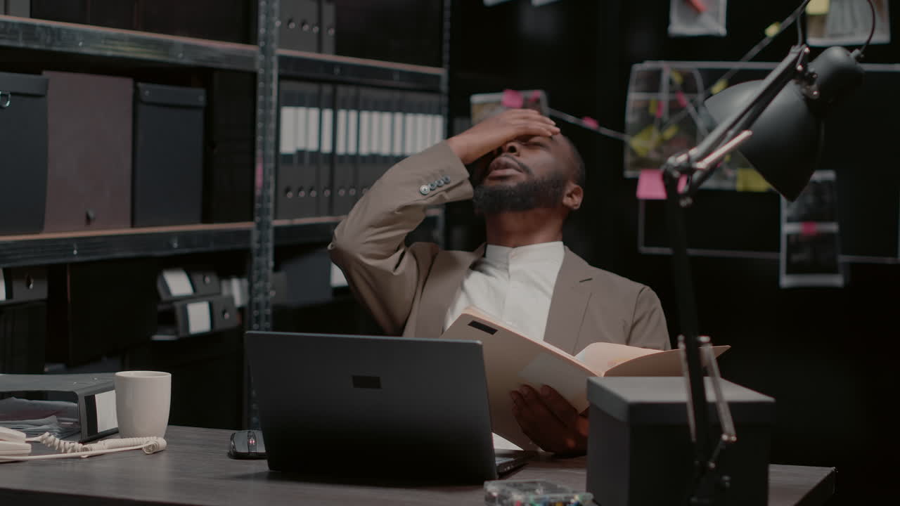 Detective Investigating Evidence in Office