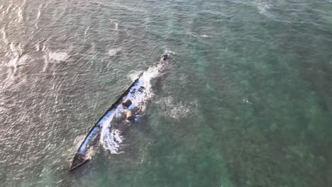 drone aerial over the mildura shipwreck in exmouth during sunset