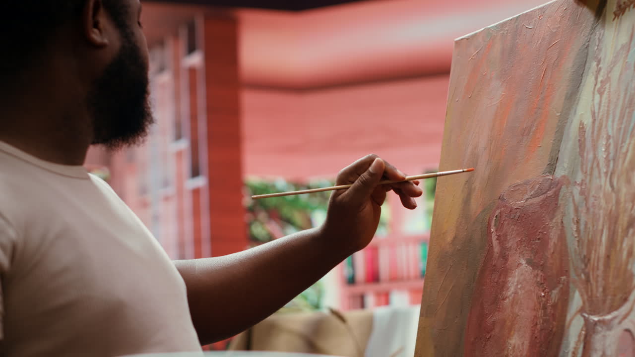 Artist painting a canvas