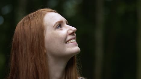 a gorgeous lady is very happy enjoying a beautiful life while thinking all her achievements - close up shot