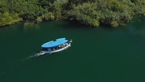 duffy electric boats cruising on turquoise water of krka national park in croatia