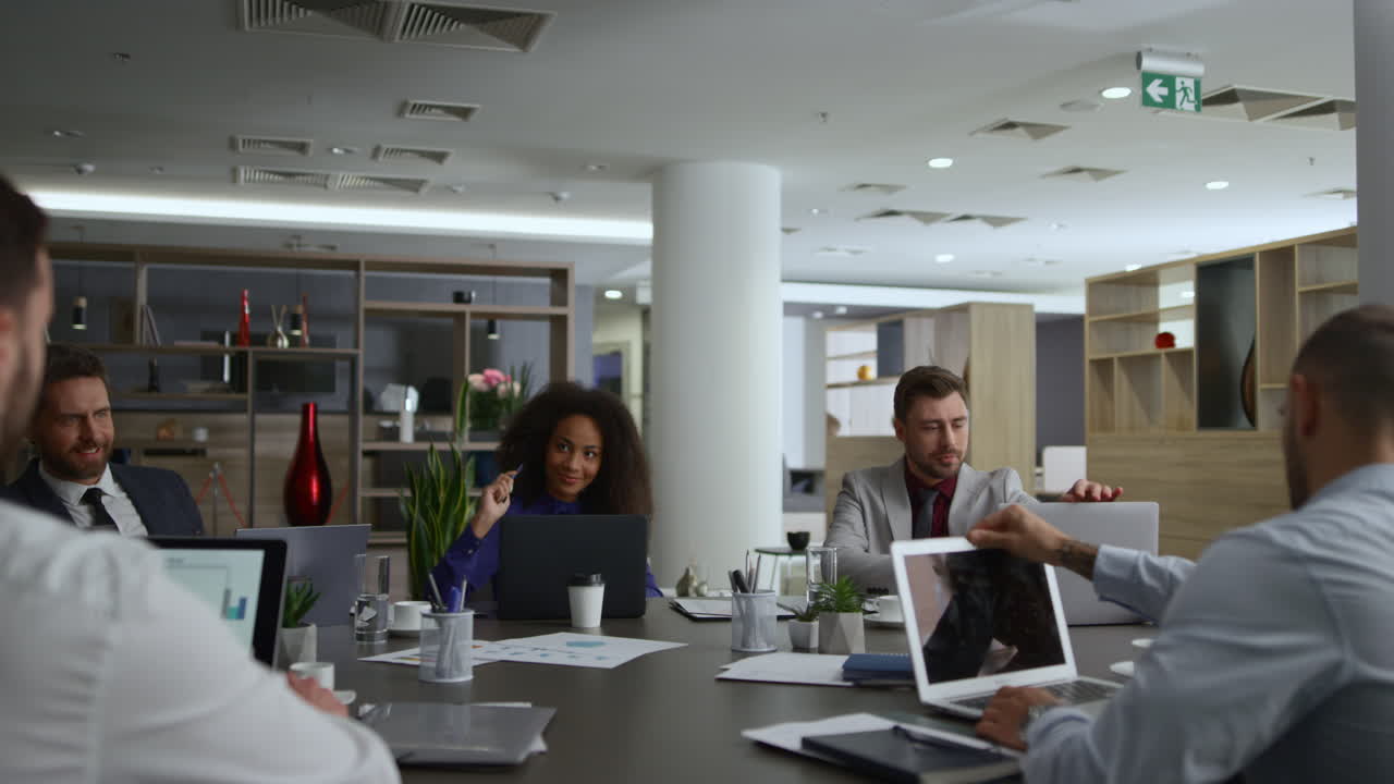 Motivated coworkers group sharing ideas