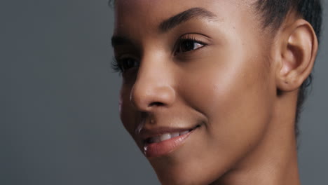 close-up-multicolor-portrait-beautiful-african-american-woman-with-colorful-light-reflecting-on-face-perfect-skin-looking-healthy-complexion-skincare-concept