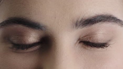 close up young woman eyes looking happy at camera positive expression