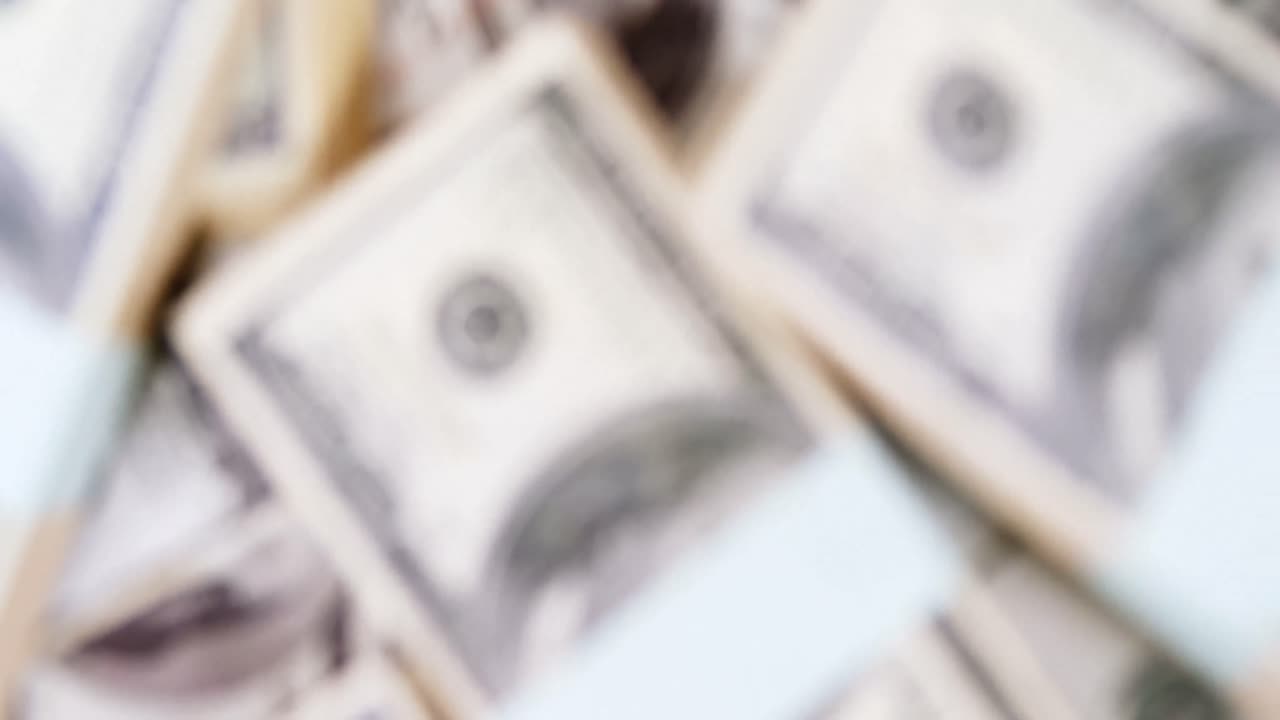 Bundles of hundred dollar currency notes