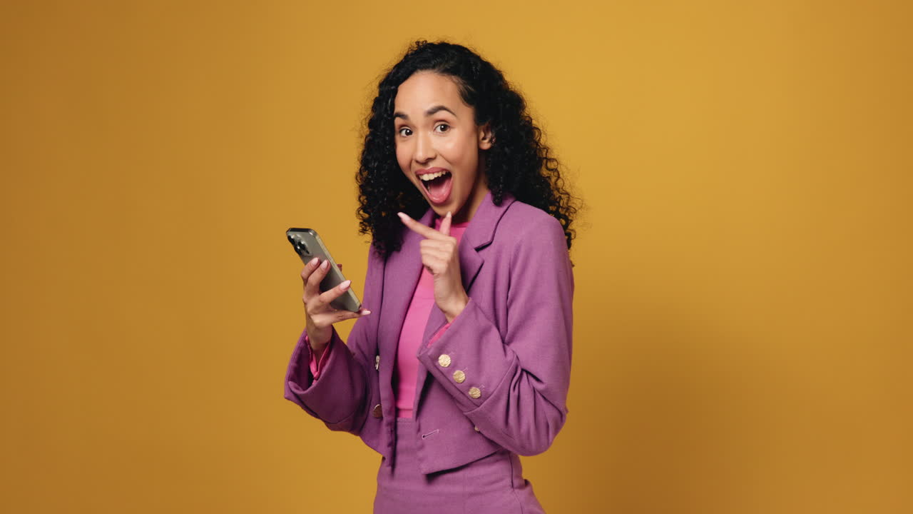 A woman looking at her phone