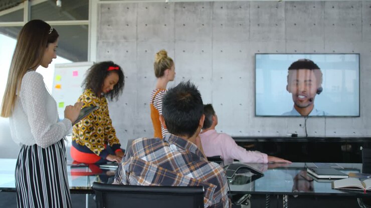 Business executives doing video conference in modern office 4k