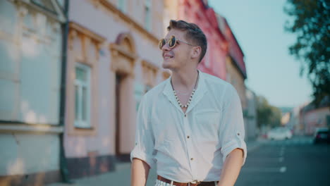 man walking in city street