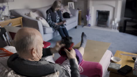 a peaceful scene in a living room with an elderly couple relaxing