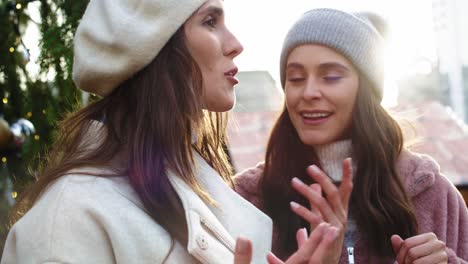 video  of two female friends having fun outdoors