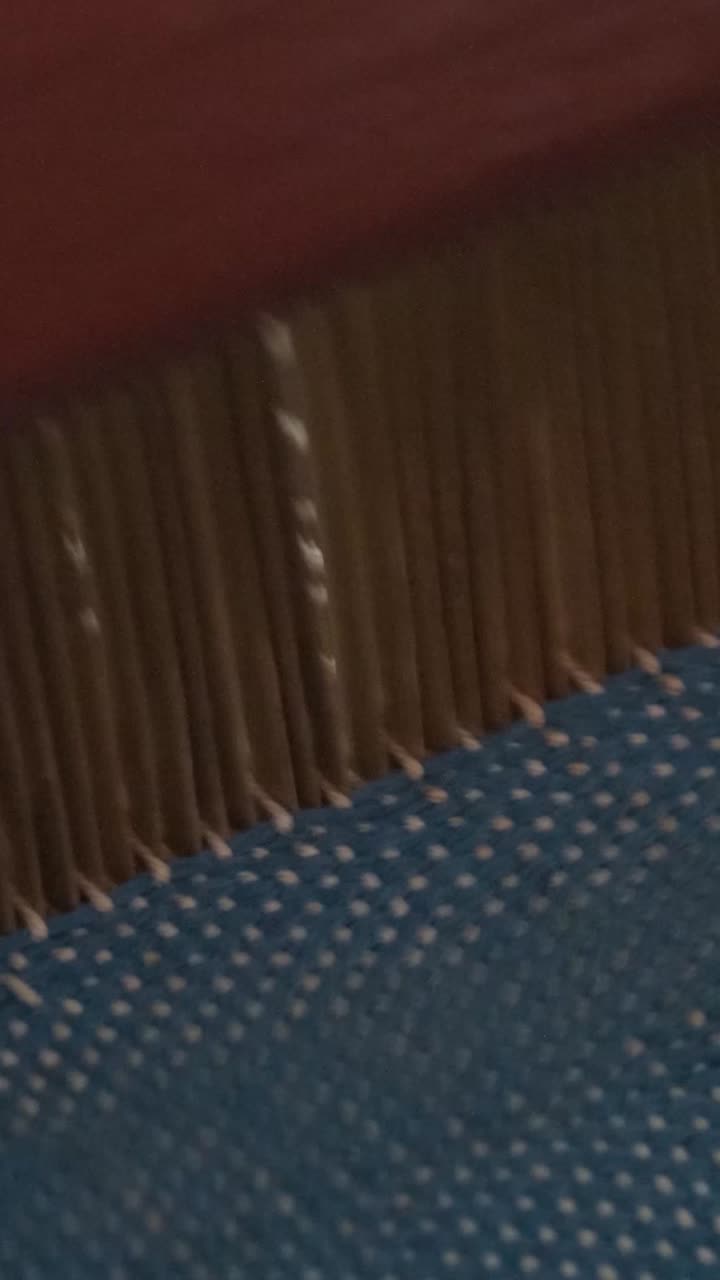 Close-up of a Loom Weaving Textile
