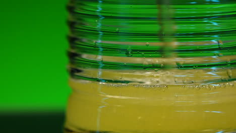 close-up of a refreshing yellow drink in a glass