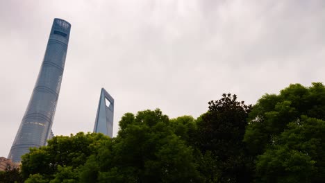 rainy day shanghai city famous megatalls buildings top sky panorama 4k time lapse china