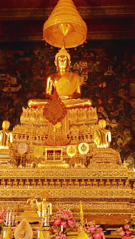 buddha statue surrounded by ornate decorations