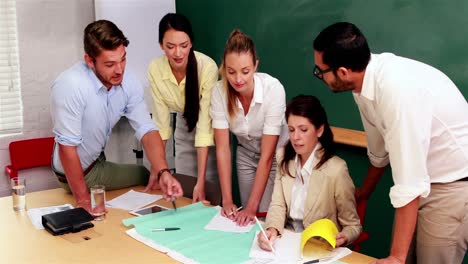 Casual-business-team-having-a-meeting-standing