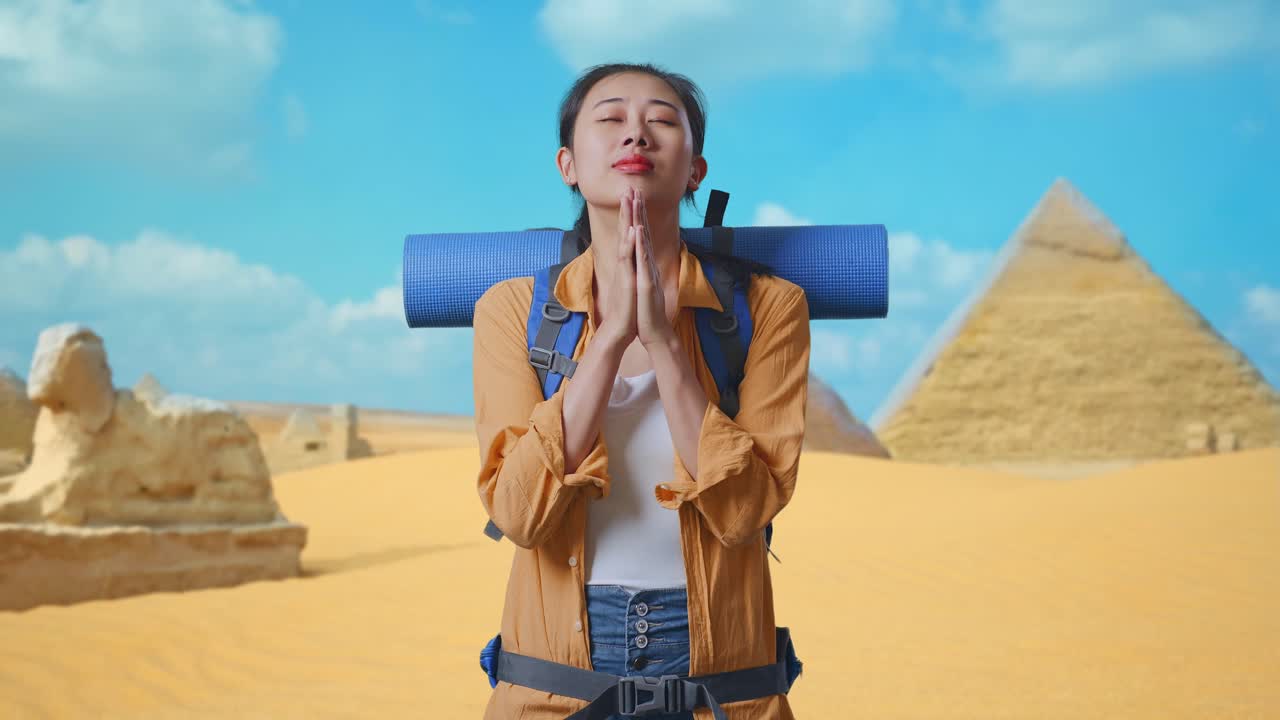 Asian Female Hiker With Mountaineering Backpack Pray For Something While Traveling In Pyramid Of Giza