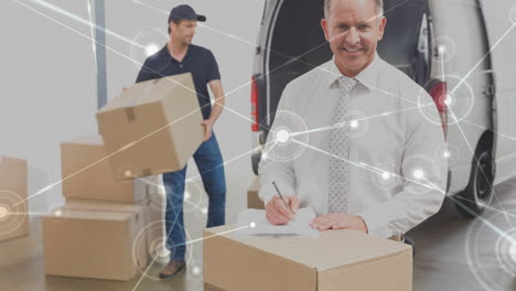 warehouse composition of two men packing boxes into a van combined with animation of connect