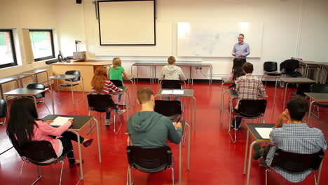 lecturer speaking to his class