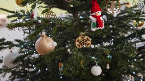 hanging fake snow on christmas tree daylight 4k