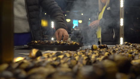 turkish chestnut seller on istanbul market during winter season