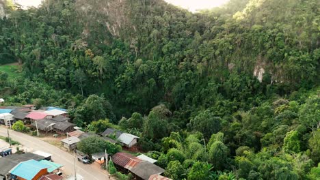 drone close up ban jabo remote small village in mae hong son province of norther thailand , home oflahu tribes community aerial footage