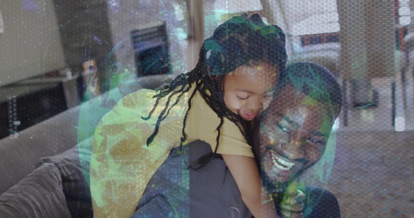 Girl hopping onto father's back on couch, father steadying, HUD globe over for playful tech demo