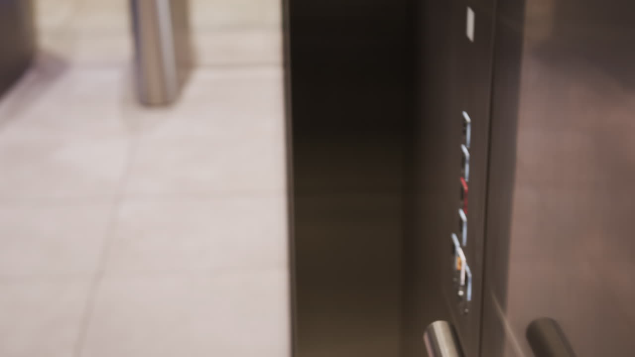 Entering elevator, businessman in white shirt heading to office meeting