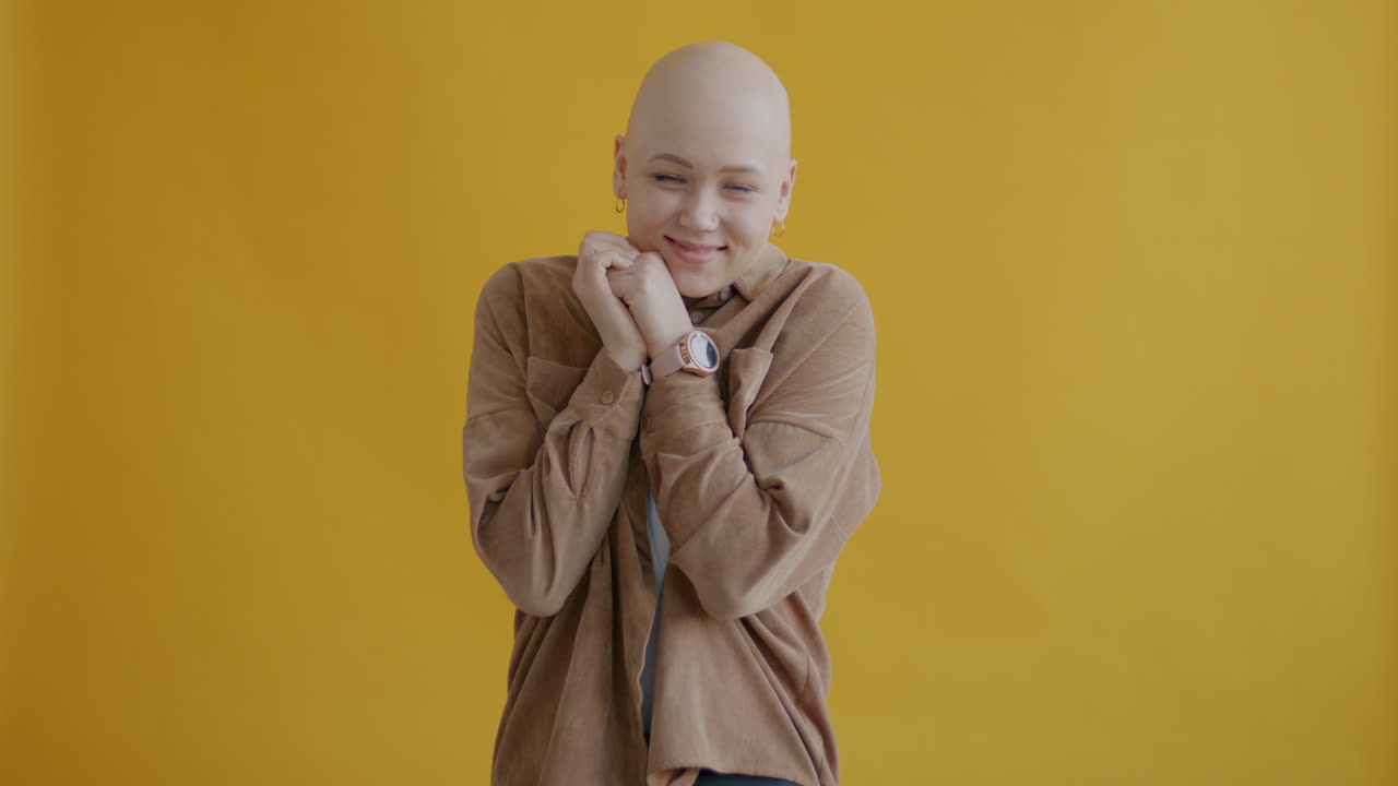 Bald Woman Smiling and Posing