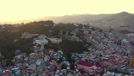 AERIAL:-Guanajuato-City-and-The-Pipila,-Mexico