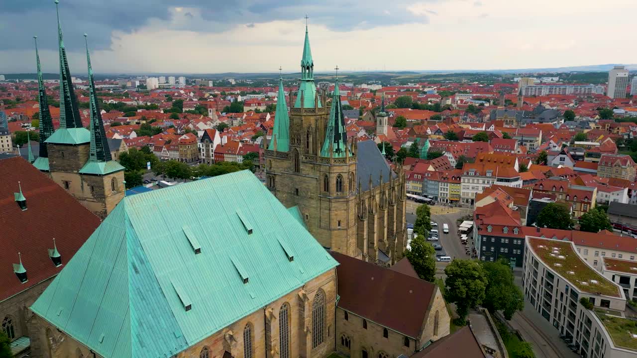 4K Aerial Drone Video of Beautiful Gothic St. Severi Church and Erfurt Cathedral overlooking the Town Square of Erfurt, Germany