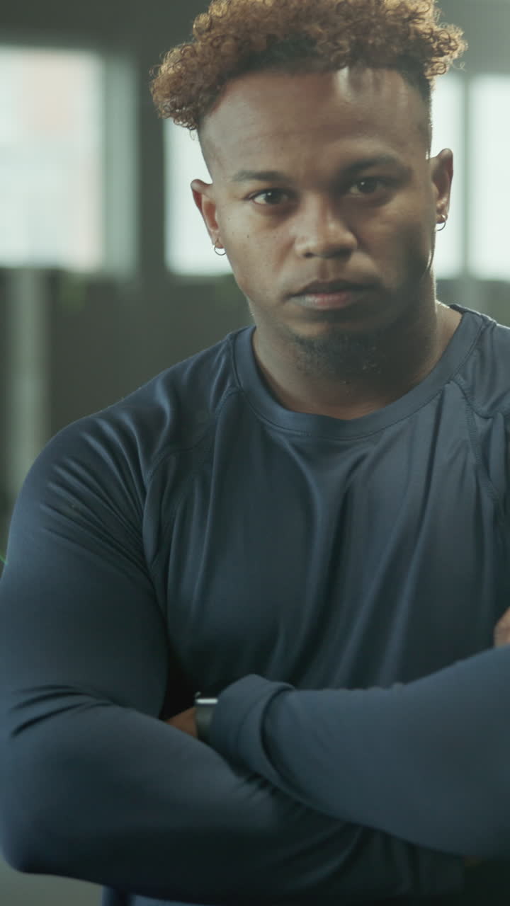 Portrait of Confident Young African American Man Looking at Camera