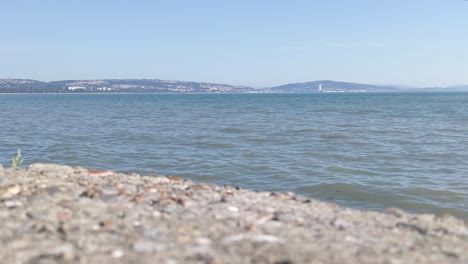 gentle sea waves rolling in on british seaside resort city