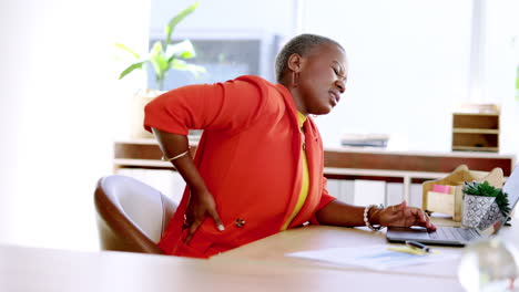 Black-woman,-back-pain-and-burnout