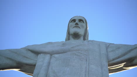 A-still-image-immortalizes-the-iconic-Cristo-Redentor,-hailed-as-one-of-the-seven-wonders-of-the-world,-set-against-the-canvas-of-a-stunning-blue-sky-in-Rio-de-Janeiro,-Brazil