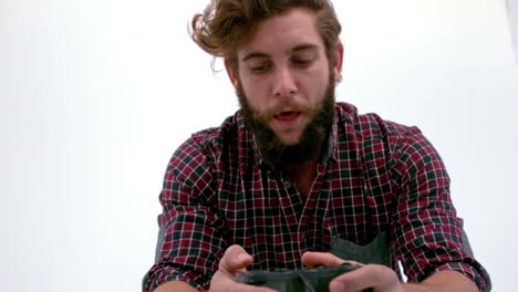 bearded hipster playing video games