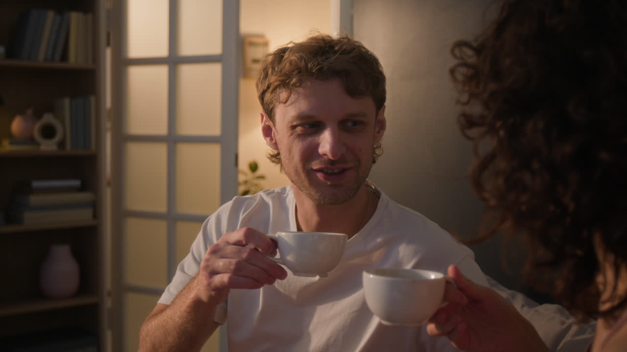 People drinking coffee indoors