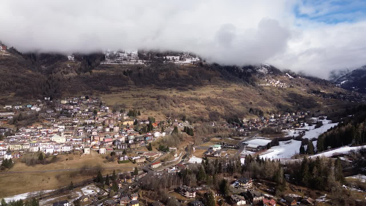 This is a large ski area that prepares Cortina 2026 in Italy. The locations are captured with a drone that shows the beauty of winter sports that combine blue sky, white snow and sunny