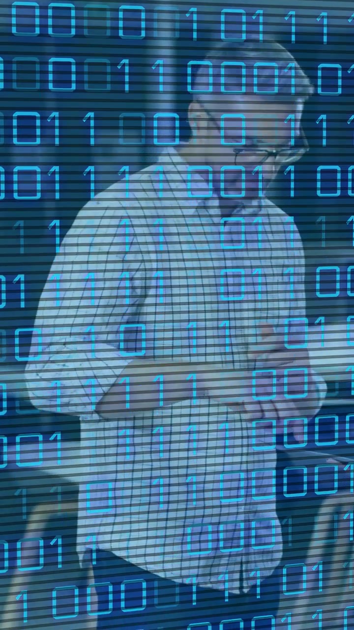 Vertical video: Presenter gesturing then tapping device, driving binary overlay in tech demo