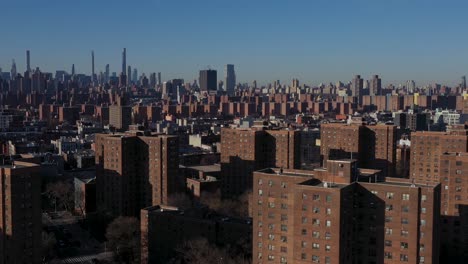 aerial flyover of harlem nyc housing project in the early morning