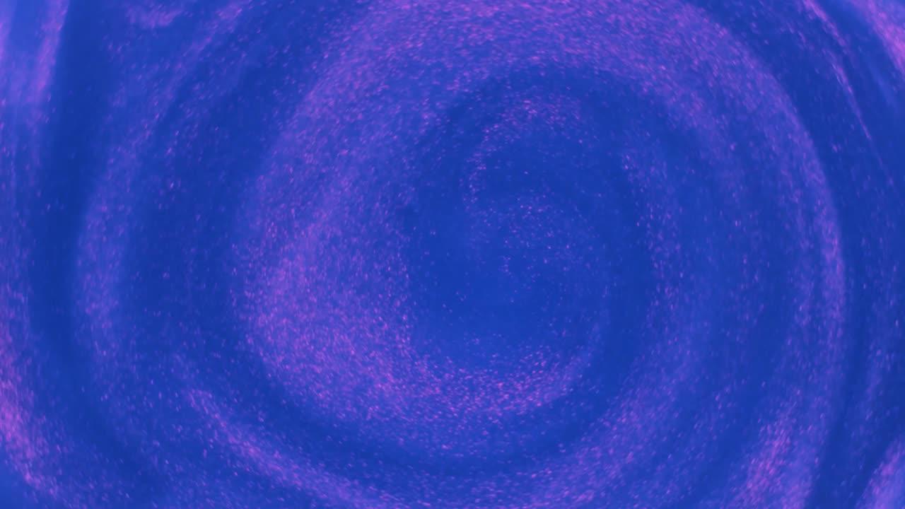 un remolino abstracto de azul y rosa