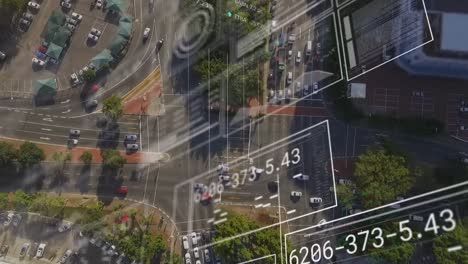 Animation-of-changing-numbers,-graphs,-loading-circles-and-bars,-aerial-view-of-moving-vehicles