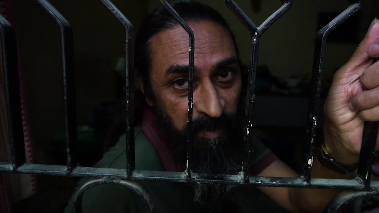 old beard man stucked in lockdown. man wants to come out but he can't