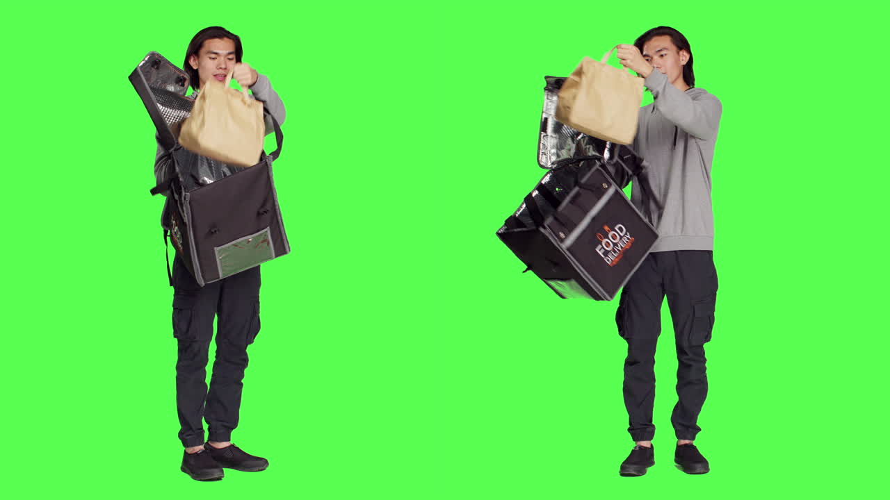 Asian guy operates on food delivery