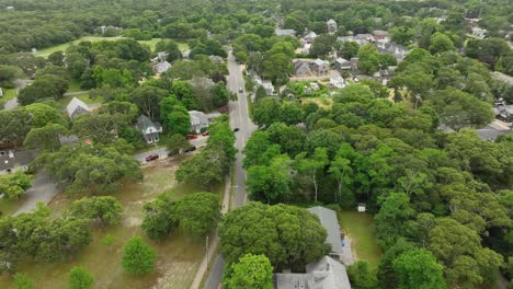 Truck-driving-through-rural-neighborhood-in-Massachusetts