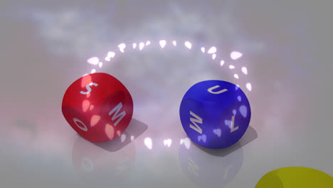 animation of glowing fairy lights over colorful dices falling against grey background