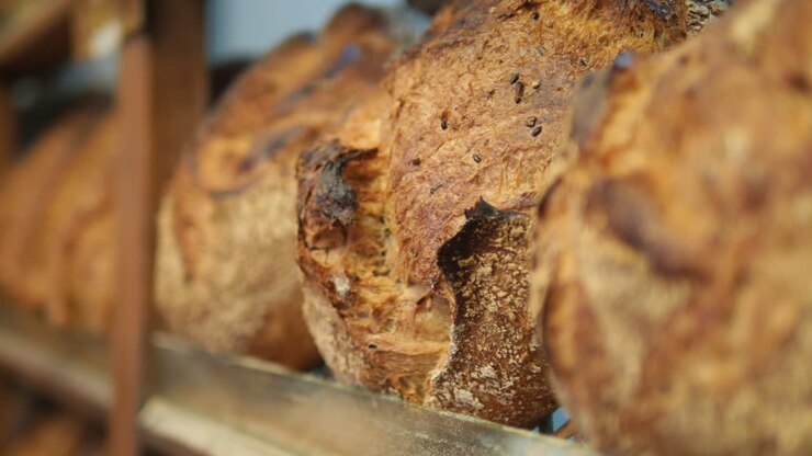 Close up of Freshly Baked Bread Loaves in a Bakery