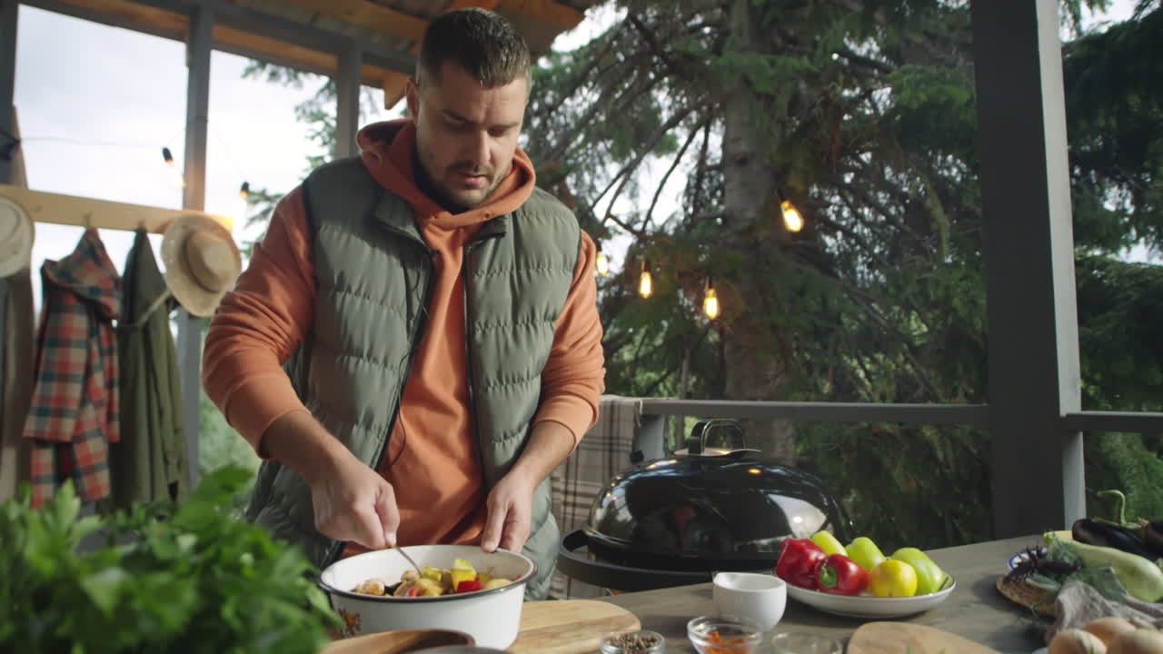 Food Blogger Mixing Veggies for Barbecuing