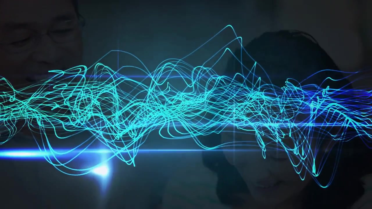 Abstract Digital Waves Overlaying Blurred People Interacting with Technology