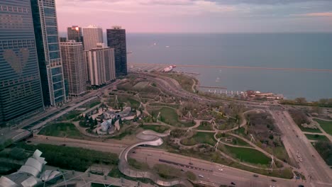 Aerial-view-of-Maggie-Daley-Park,-Chicago-skyline-and-Lake-Michigan