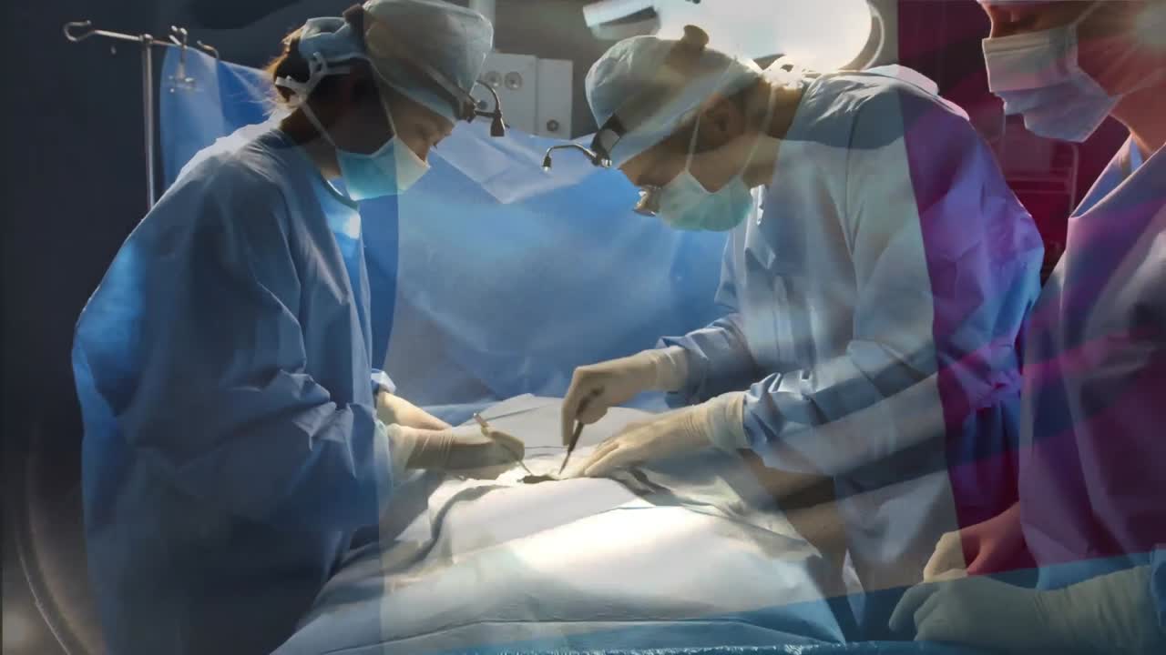 animación de la bandera de francia ondeando sobre los cirujanos en el quirófano